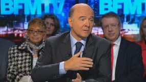 Pierre Moscovici, le ministre de l'Economie, était l'invité de BFM Politique ce 8 décembre