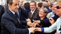 Nicolas Sarkozy en déplacemen à Bordeaux, mardi. La cote de popularité du chef de l'Etat gagne trois points à 37%, selon un sondage Ifop publié mardi, mais reste loin de celle du candidat socialiste à la présidentielle, François Hollande, qui perd sept po