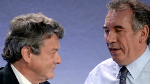Le président de l'UDI Jean-Louis Borloo avec celui du Modem François Bayrou, ici lors d'un meeting du Modem à Paris, le 18 janvier 2014.