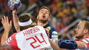 Kentin Mahé à la lutte avec Mikkel Hansen et Henrik Toft Hansen
