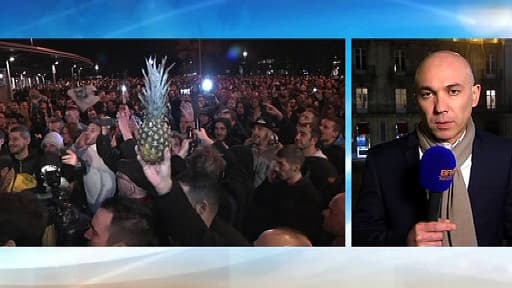 Me Jacques Verdier (d.), ce vendredi matin sur BFMTV. A gauche, les fans déçus par l'annulation du spectacle à Nantes, la veille.