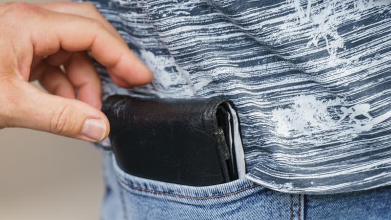 Un pickpocket. (Illustration)