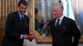 Le chanteur Stromae décoré le 21 novembre 2024 par le roi des Belges Philippe lors d'une cérémonie au palais royal à Bruxelles