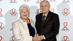 Line Renaud et Pierre Bergé lors d'une conférence pour le Sidaction à Paris en 2014
