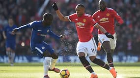 Anthony Martial face à N'Golo Kanté - AFP