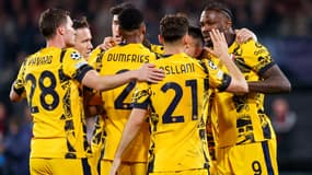 Les joueurs de l'Inter sur la pelouse du Feyenoord Rotterdam, le 5 mars 2025 en Ligue des champions