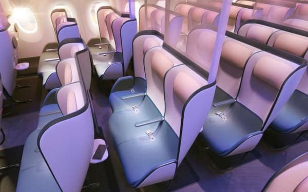 En classe économique, les sièges arborent des parois en plastique de séparation et la configuration des sièges en quinconce maximise la sensation d'espace personnel. En classe économique, les sièges arborent des parois en plastique de séparation et la configuration des sièges en quinconce maximise la sensation d'espace personnel.