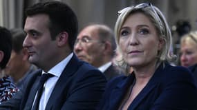 Florian Philippot et Marine Le Pen lors d'un meeting à Paris le 9 décembre 2016