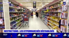 Restrictions sanitaires: les supermarchés dans les centres commerciaux déstabilisés 