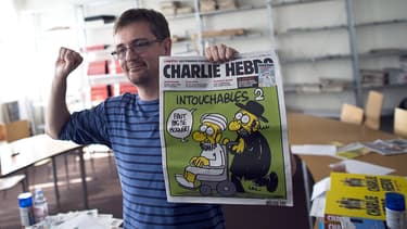 Charb à la rédaction de Charlie Hebdo en septembre 2012.