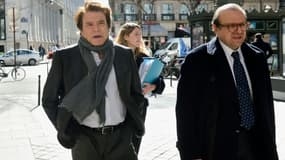Bernard Tapie et son avocat  Hervé Temime à leur arrivée au pôle financier le 12 mars 2015 à Paris