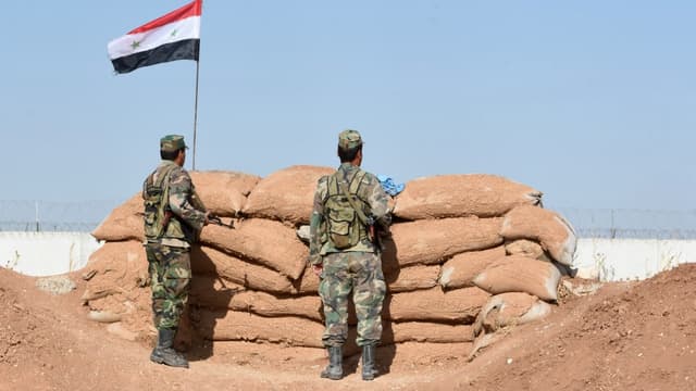 Des hommes des forces syriennes près de Kobane, proche de la frontière avec la Turquie, le 3 novembre 2019