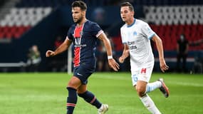 Juan Bernat et Florian Thauvin lors de PSG-OM, à Paris le 13 septembre 2020
