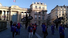 L'ONG Attac mène "une action désobéissante" devant l'Assemblée nationale à Paris, le 7 février 2023, contre la réforme des retraites.
